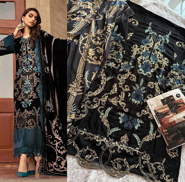 Woman wearing a black and teal embroidered pakistani suit with 3D floral detailing and matching dupatta – ideal for  receptions, festive wear in UAE from Meraki Vastram.