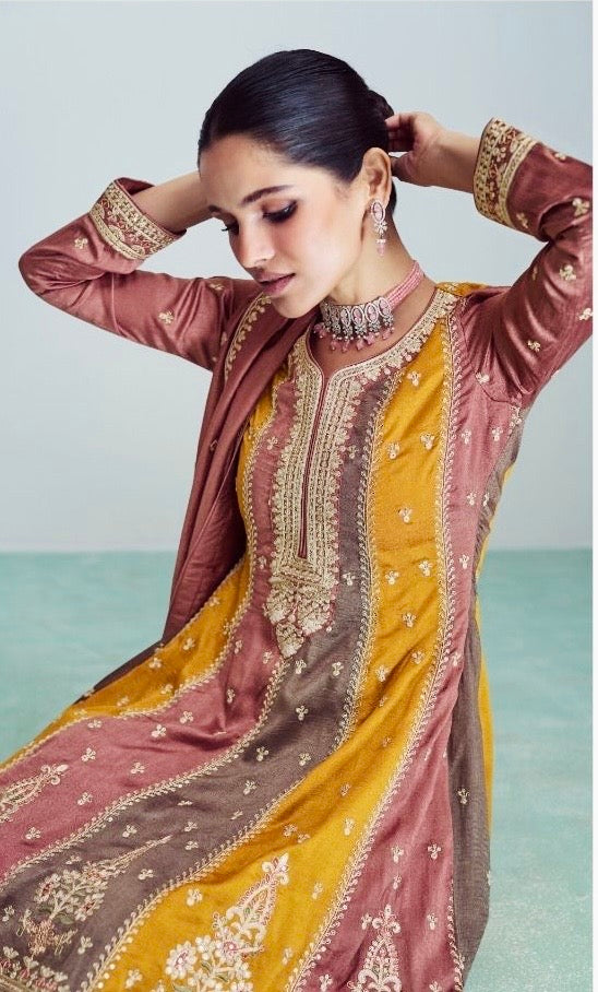 Woman wearing a mustard and mauve straight-cut embroidered suit with matching pants and dupatta, ideal for festive and wedding occasions like Diwali, Teej, Rakhi – Meraki Vastram ethnic wear UAE.
