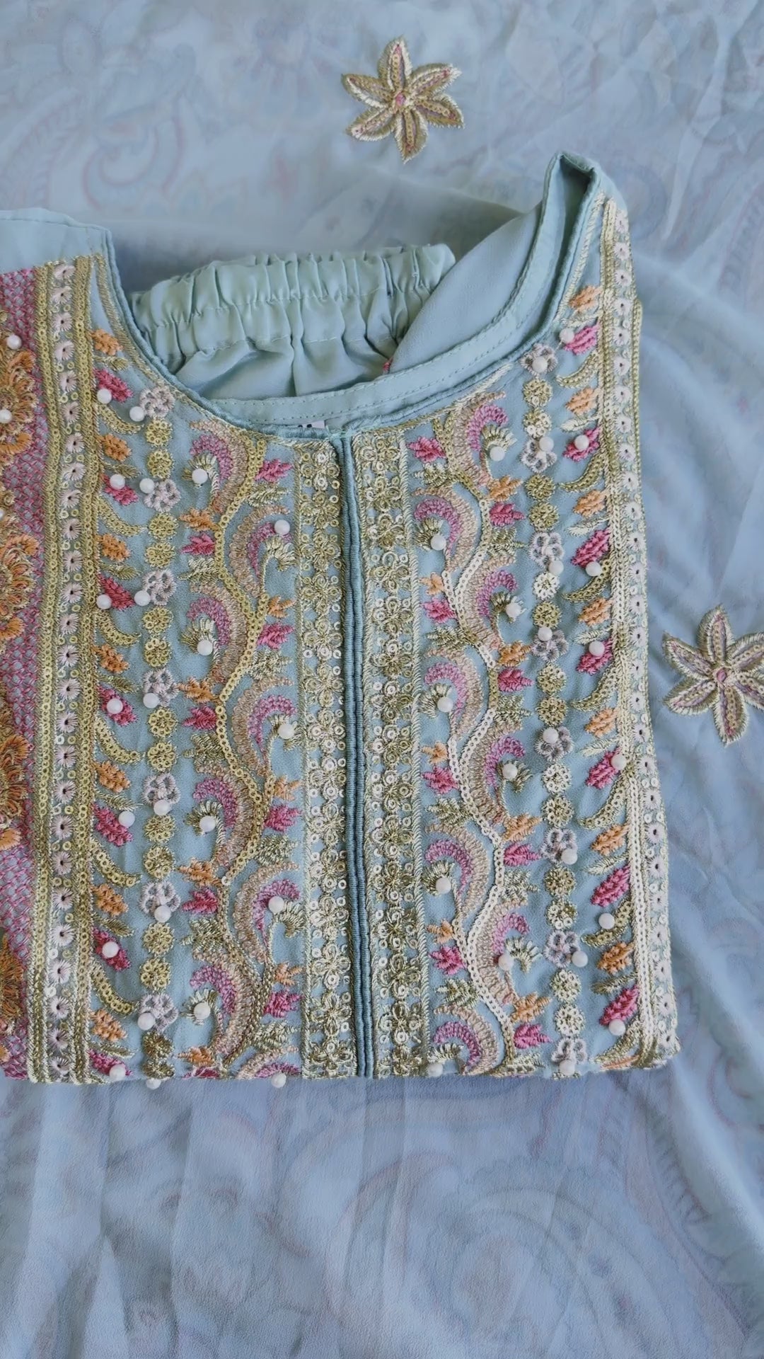 Woman wearing a powder blue pastel pakistani pret embroidered suit set with straight pants and dupatta – perfect for Eid, Rakhi, and festive daywear in UAE by Meraki Vastram.